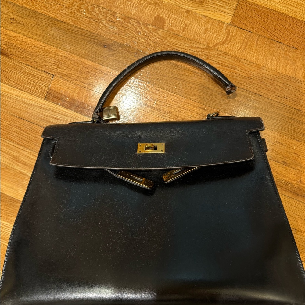 Elegant Black Leather Hermes Kelly authentic Handbag